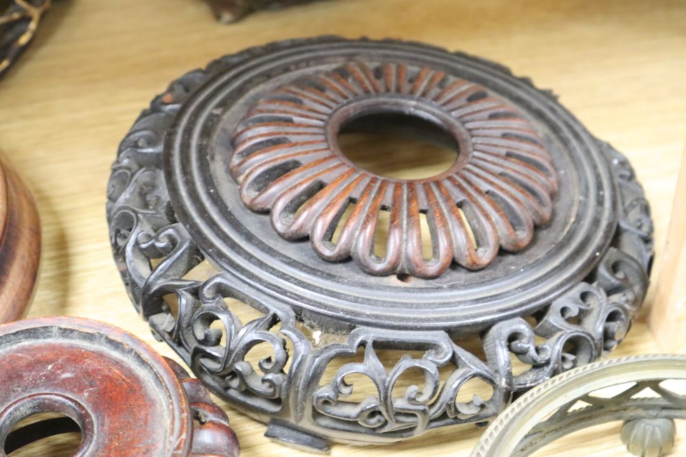 A collection of Chinese bronze and wood stands, etc.